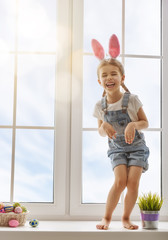 Wall Mural - girl wearing bunny ears