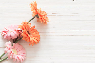 gerbera flowers on the wooden table