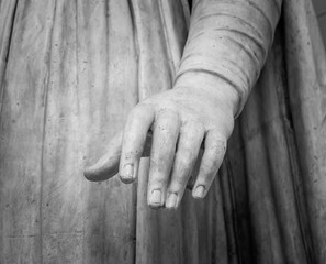 Wall Mural - stone statue detail of human hand 