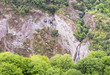 Mountain landscape waterfall flows down the cliff. The landscape in Armenia (Tatev). The canyon next to the cable car 