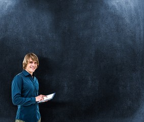 Poster - Composite image of hipster businessman using tablet