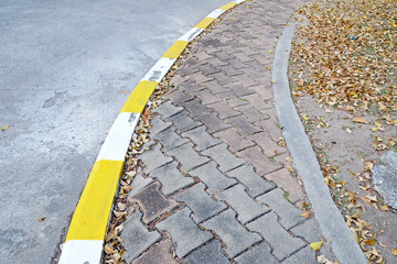 footpath pavement sidewalk with traffic sign