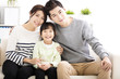 © Tom Wang - Happy Attractive Young  Family Portrait