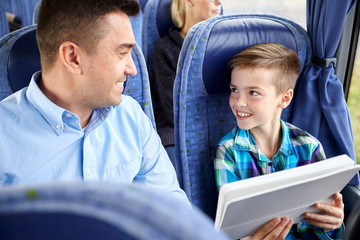 Sticker - happy family with tablet pc sitting in travel bus