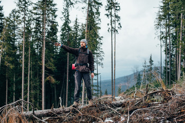Wall Mural - caucasian male hiking in mountains
