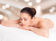 Woman relaxing in spa salon