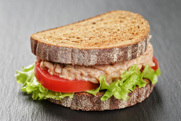 Wall Mural - rye bread sandwich with tuna and vegetables