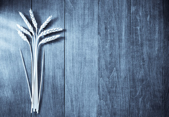 Wall Mural - ears of wheat on wood