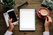 © Dirima - Tablet and smartphone on entrepreneur desk at home