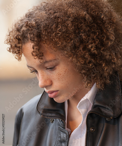 Biracial Tween Boy In Leather Jacket Buy This Stock Photo And