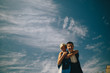  bride and groom  on the background of sky