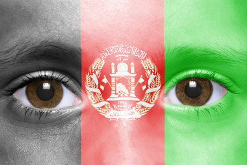 Wall Mural - human's face with afghanistan flag