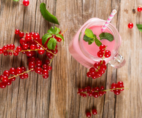 Wall Mural -  Milkshake of redcurrant, shot from above