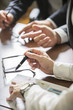 © de Art - closeup of hands with financial charts at business meeting in the office