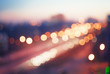 © darkbird - Blurred defocused lights of traffic in the city