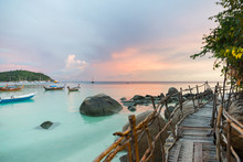 Wood Bridge With Sunset At Pattaya Beach In Koh Lipe Island