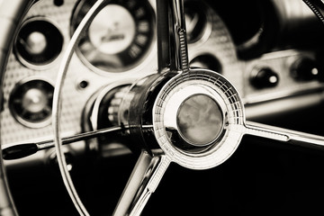 Classic car with close-up on steering wheel