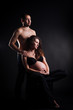 © sushytska - handsome young man embracing his beautiful pregnant wife