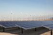 Renewable Solar Energy and Windmills. Solar panels energy in a California desert. Sunlight, solar panels and wind turbines. 