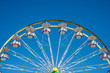 Carnival Ferris Wheel with Clean Skies. Close up shot of half of a ferris wheel in Coachella California.