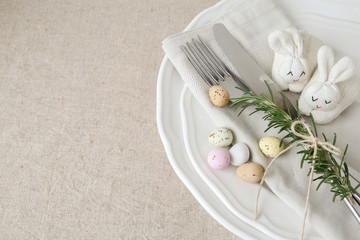 Wall Mural - Easter table setting with Easter eggs and bunnies for lunch or dinner