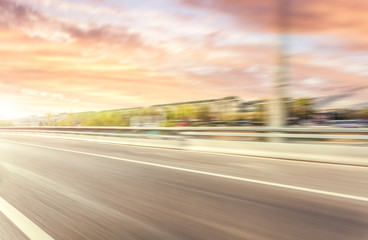 Wall Mural - Car driving on road, motion blur