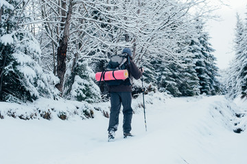Wall Mural - man hiking in mountains