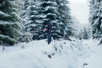 Wall Mural - man hiking in mountains