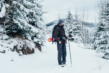 Wall Mural - man hiking in mountains