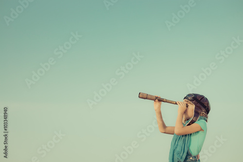 Fototapeta Happy kid playing outdoors