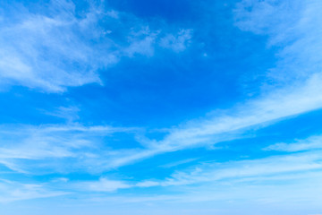 Wall Mural - blue sky background with tiny clouds