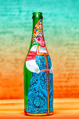 Wall Mural - Russian woman in national dress and headdress, painted by the artist in the decorative bottle. contemporary art