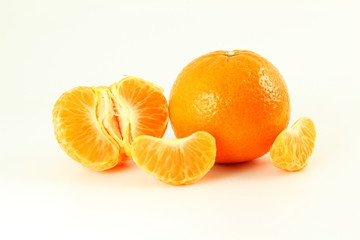 Ripe mandarin  tangerine orange  closeup on a white background