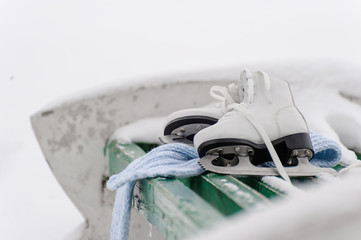 Figure skates in snow close-up