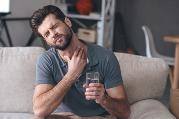 Canvas Print - Terrible pain in his throat. 