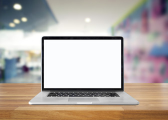 Poster - Laptop with blank screen on table. interior background, blurred