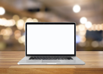 Poster - Laptop with blank screen on table. interior background, blurred
