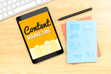 Poster - Content Marketing word on tablet screen with icon on blue notebo