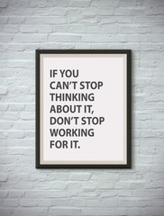 Inspirational motivating quote on picture frame.