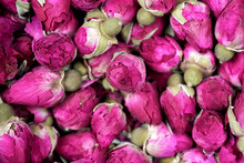 Rose Tea - Dried Rosebuds Flowers Texture Closeup. Dry Roses Petals For Asian Tea And Spices. Copyspace For Element Or Background.