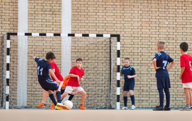 Poster -  Boys kicking ball