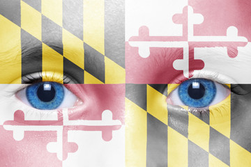 Wall Mural - human's face with maryland state flag