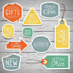 Wall Mural - Stickers on rustic wood background for retail