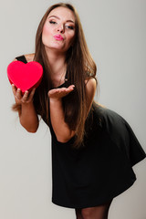 lovely woman with red heart shaped gift box