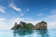 Thailand Chicken Head island cliff over ocean water during tourist boat trip in Railay Beach resort