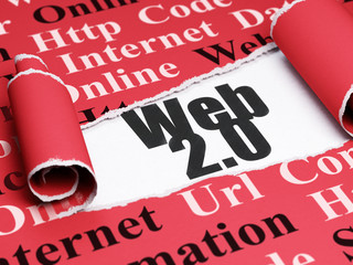 Web development concept: black text Web 2.0 under the piece of  torn paper
