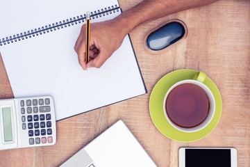 Poster - Businessman writing on notebook