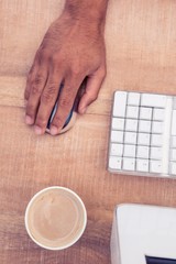 Poster - Businessman using mouse while working 