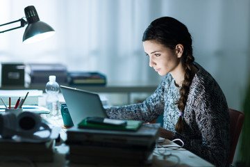 Pretty student doing homework