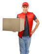 © Africa Studio - Young handsome delivery man with a carton package, isolated on white